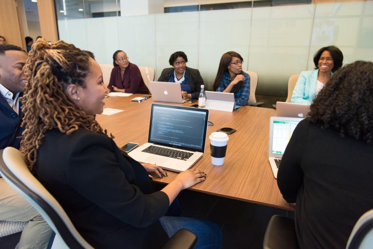 Board members having a meaningful conversation in a meeting room