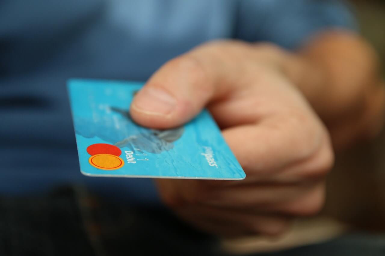 Person holding a credit card