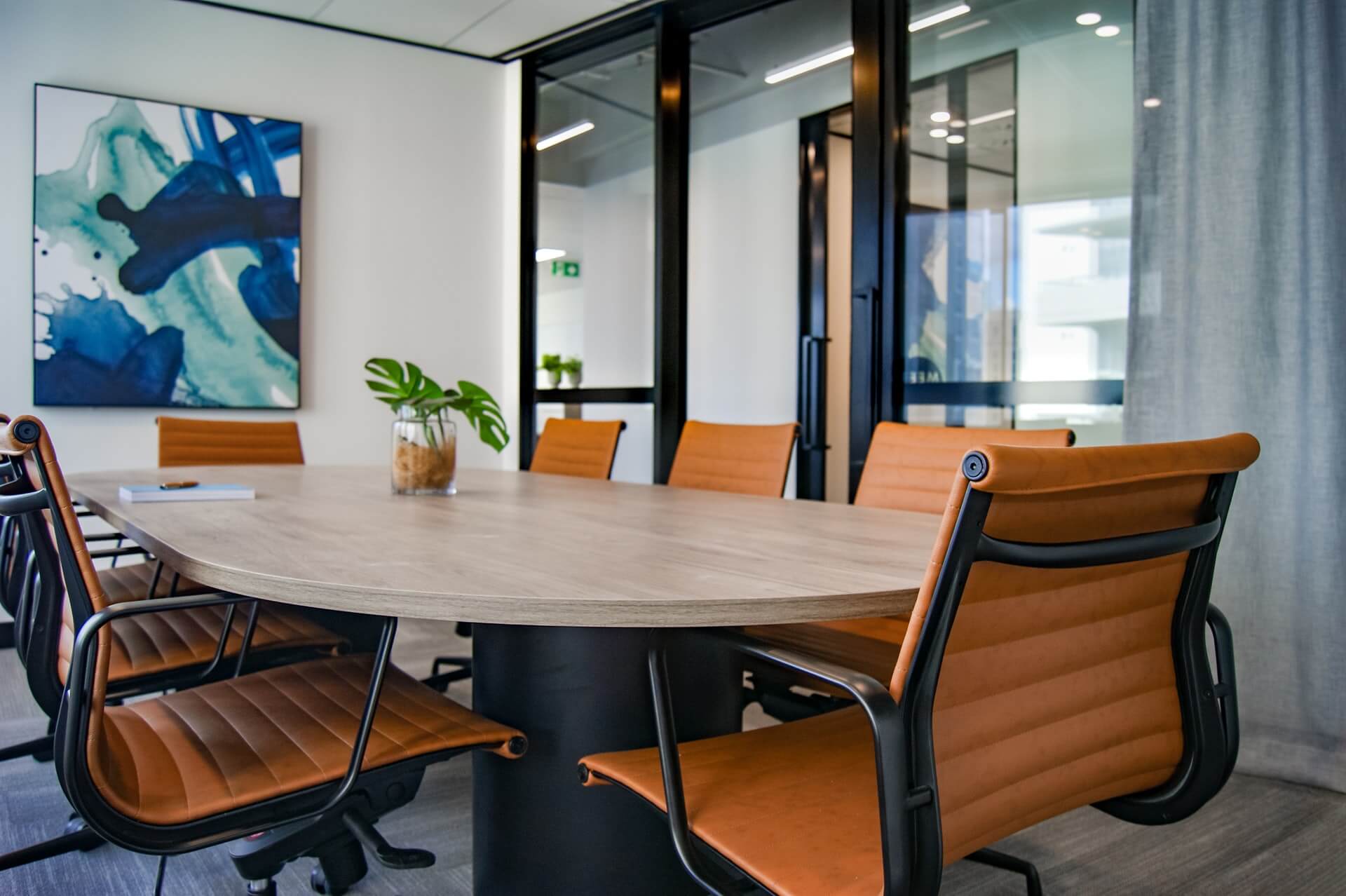 An empty business board meeting room with a wallpaper on the wall