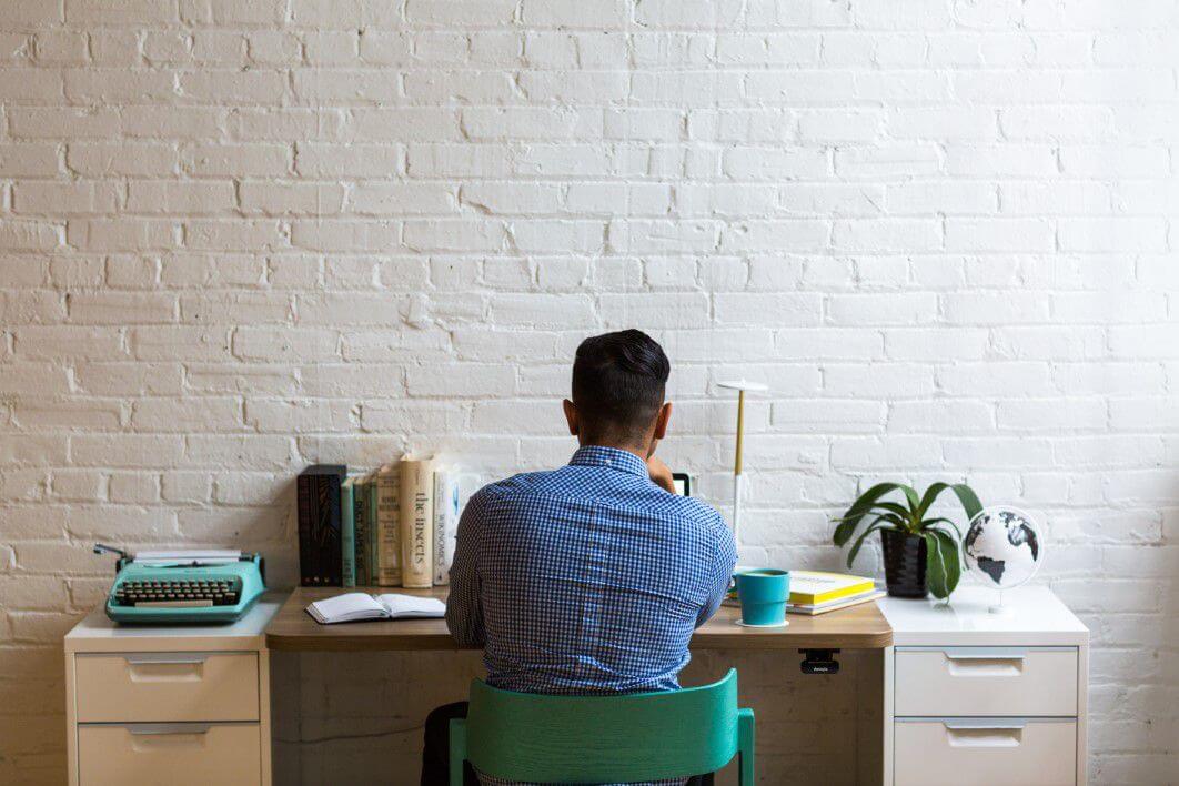 Businessman thinking about designing a "ask package" to source for funds from donors