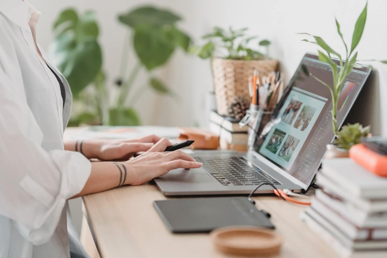 Woman working with her laptop in a workplace