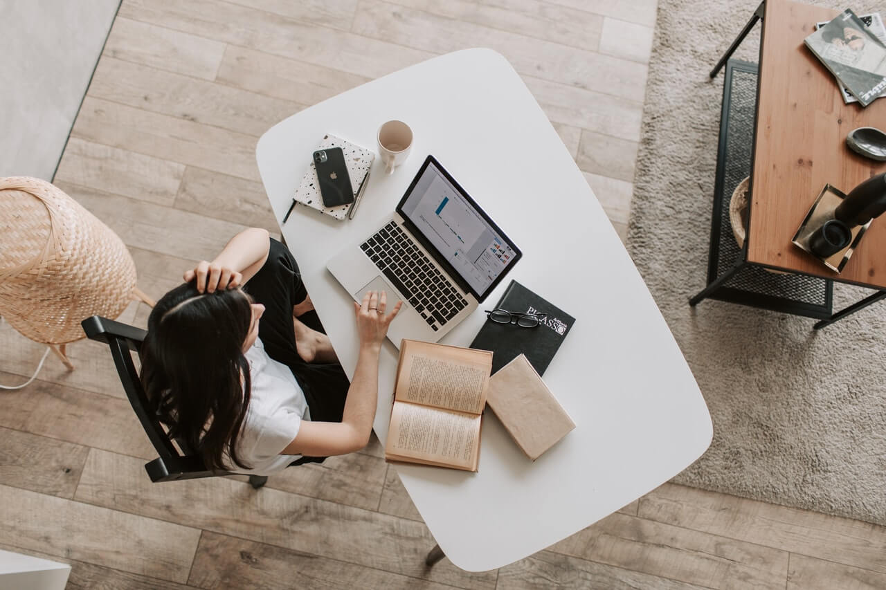 Open book on a Young professional's desk