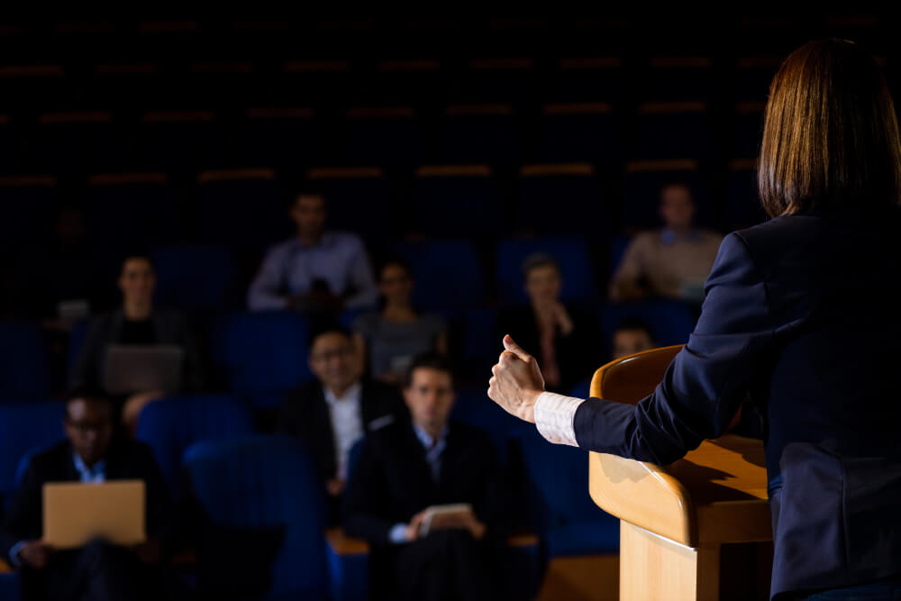 Female executive giving a speech