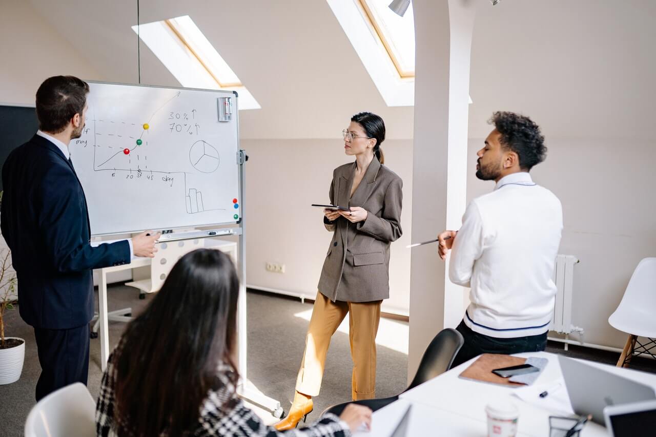 Business professionals deliberating in a workspace