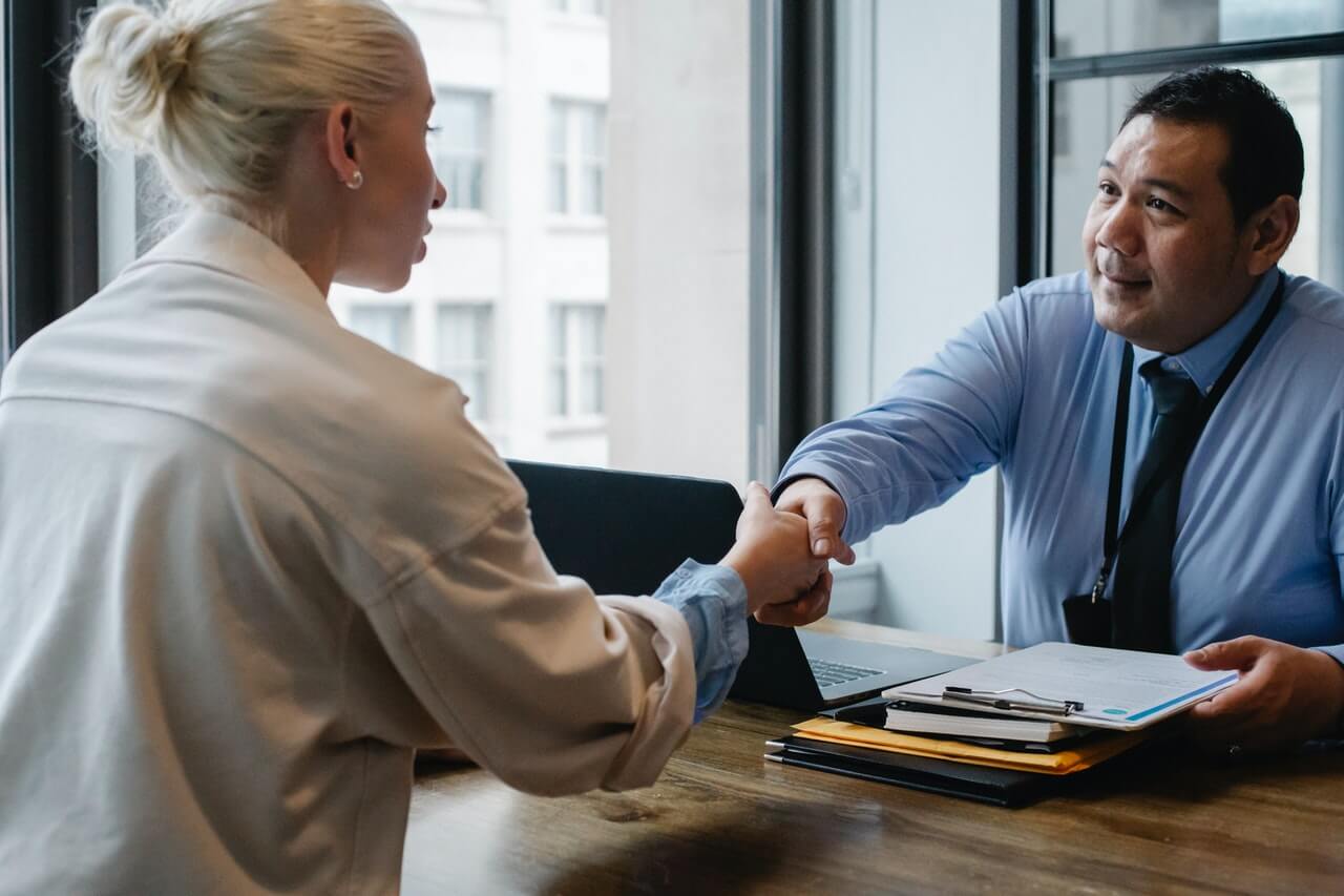 Two business colleagues shaking hands