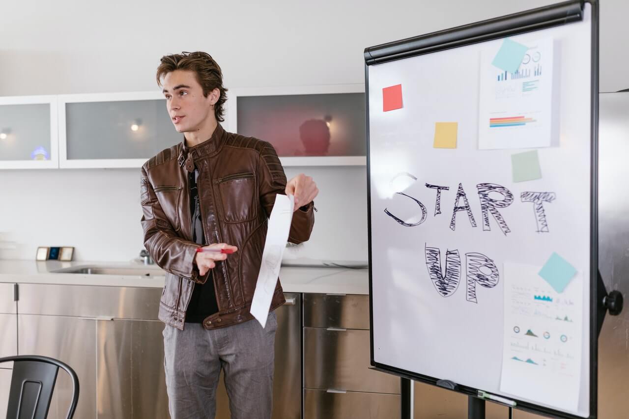 A man presenting in an office space