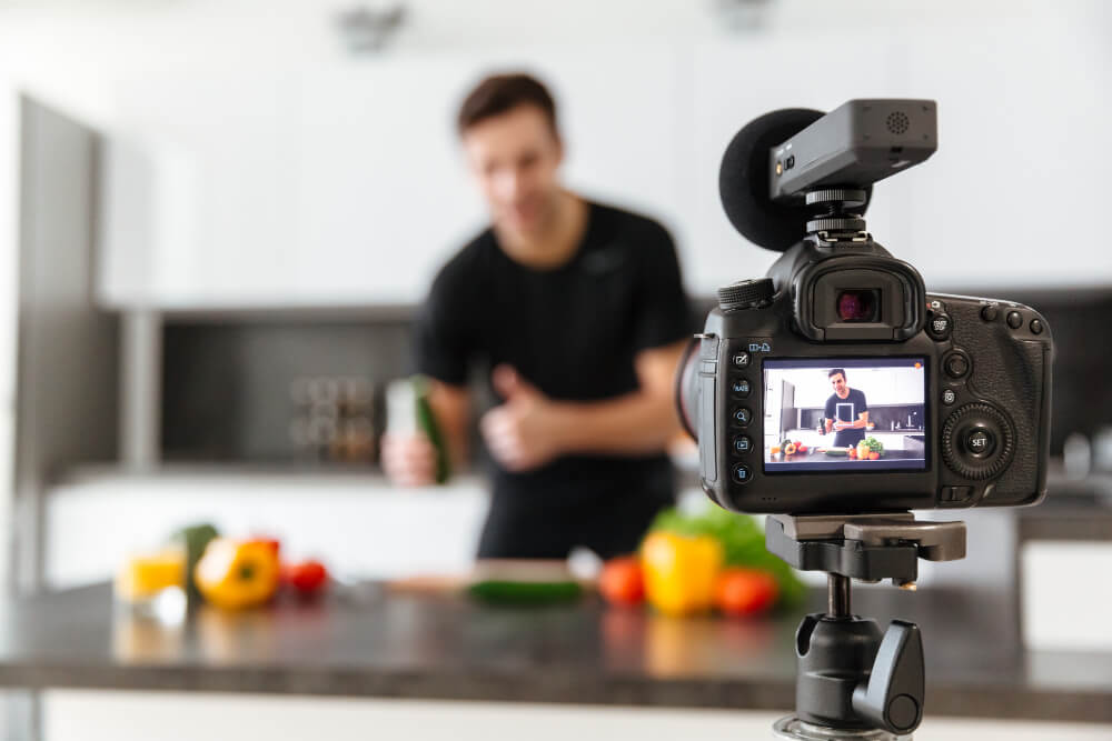 Young entrepreneur filming himself