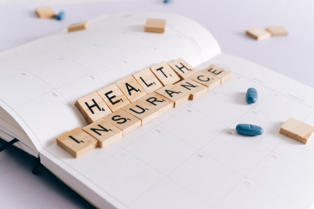 Scrabble tiles health insurance