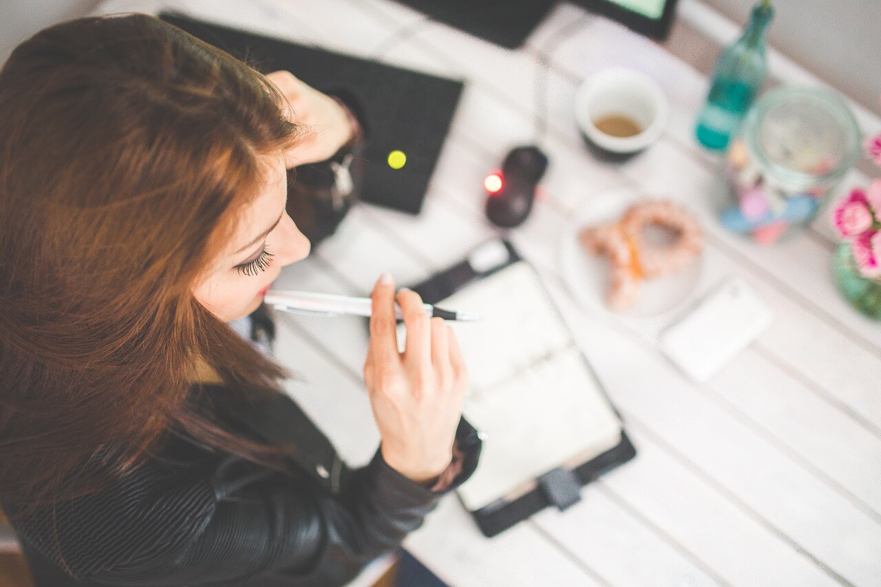 A relative young woman in a workspace