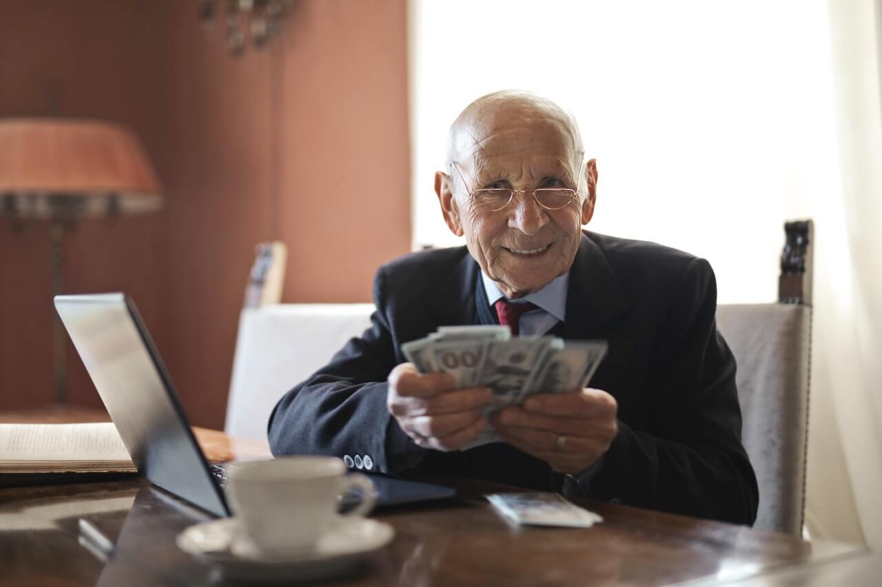 An executive director holding money