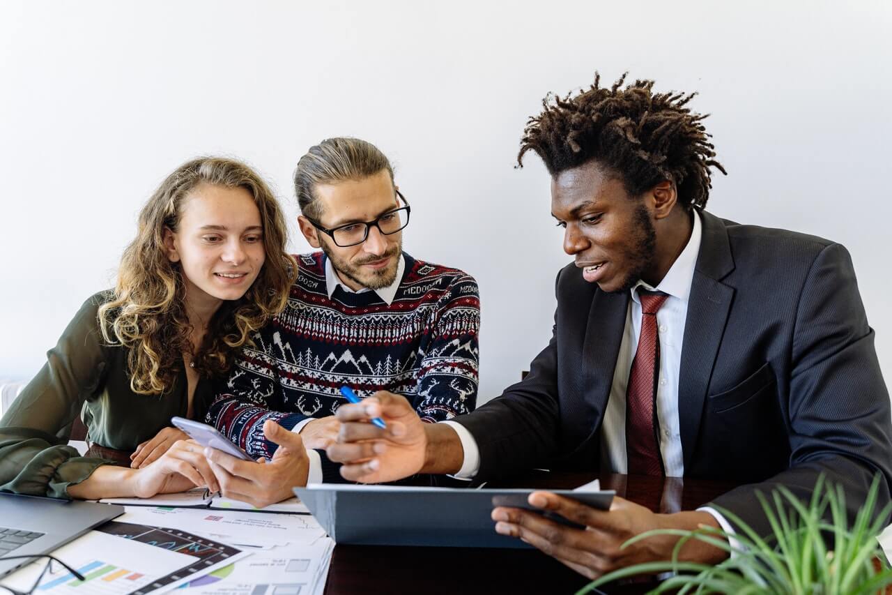 A team developing financial information for grants