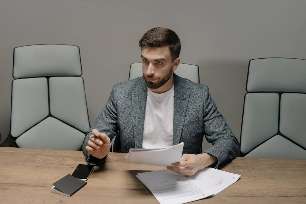 A serious professional in his office