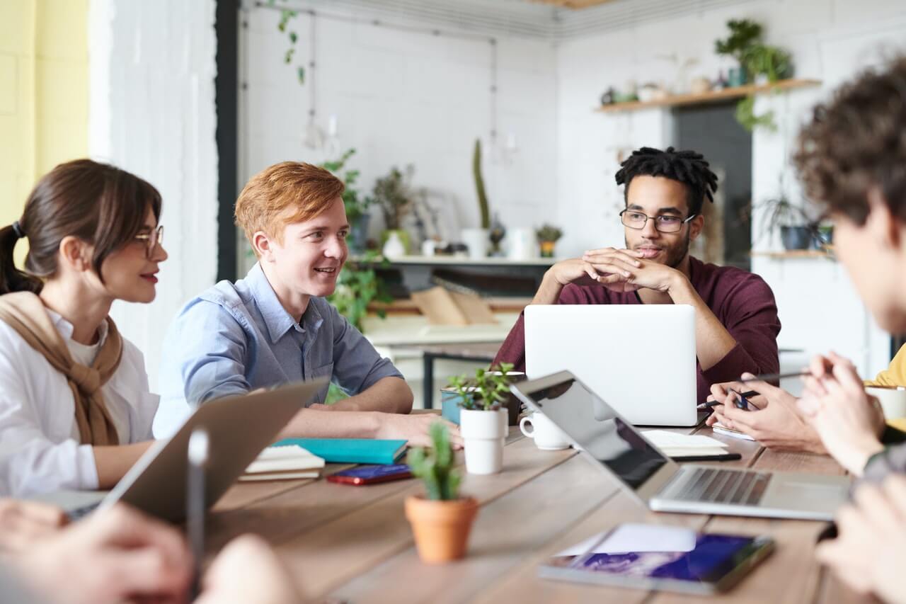 A business team conducting a donor research