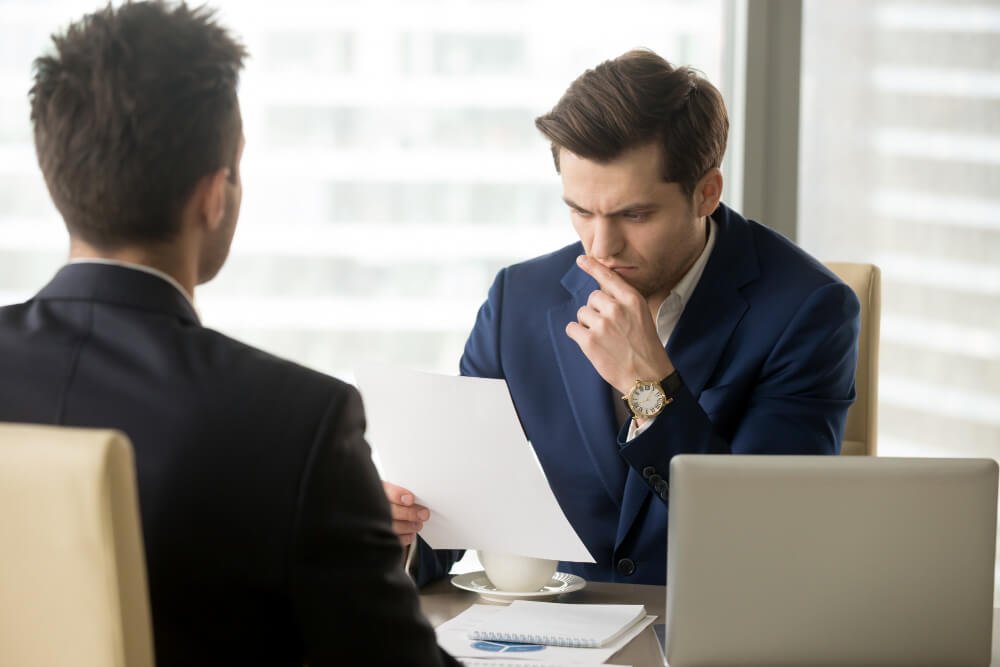 Business colleagues going over a grant proposal