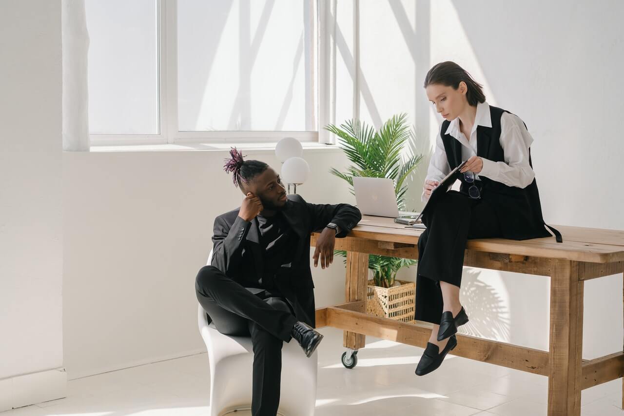 A man and a woman having a fundraising talk