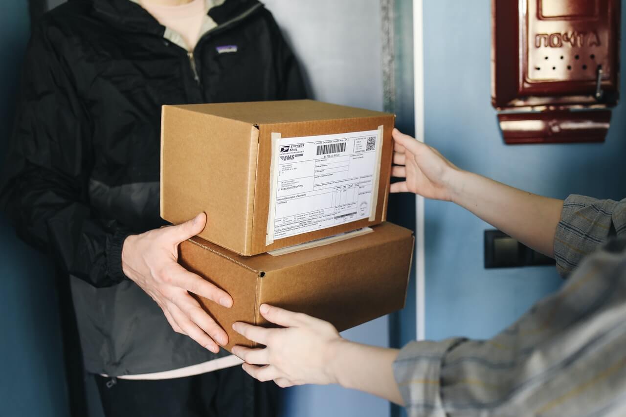 person receiving a gift box for fundraising