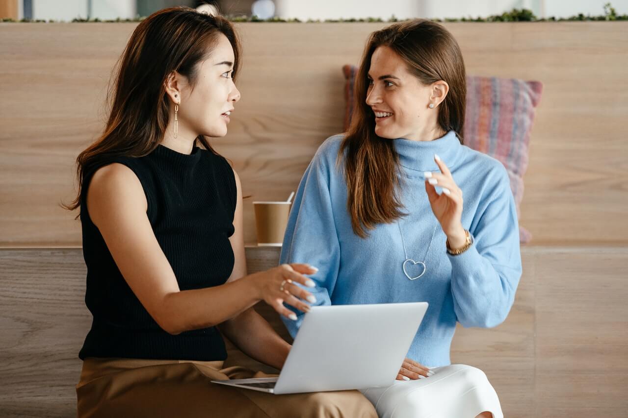 Two fundraisers discussing an up-front- fee