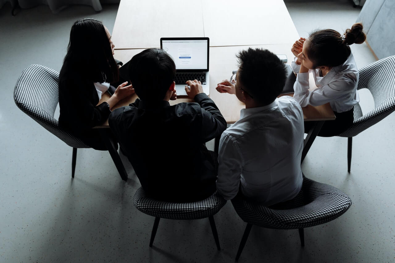 members of a gift club in a meeting.