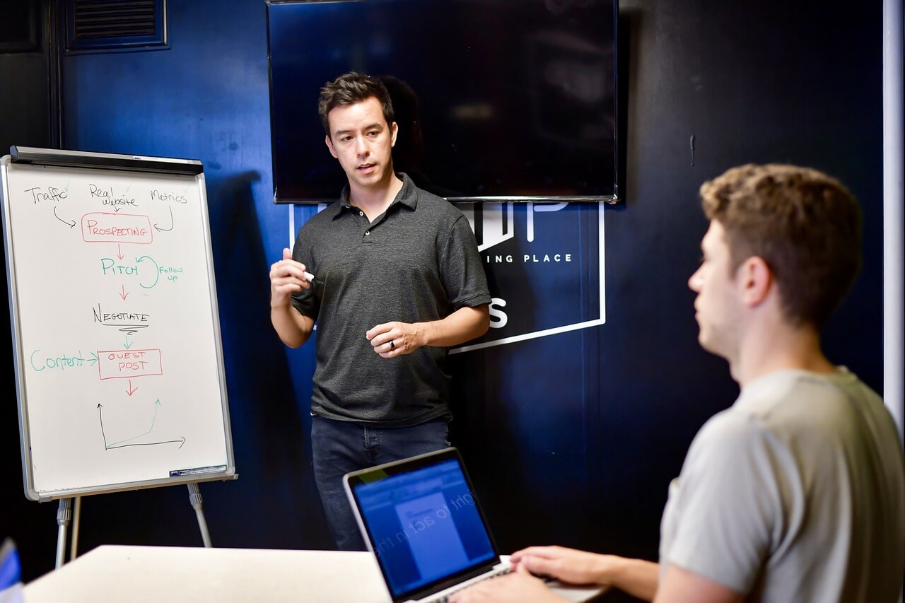 A grant seeker discussing with a program officer