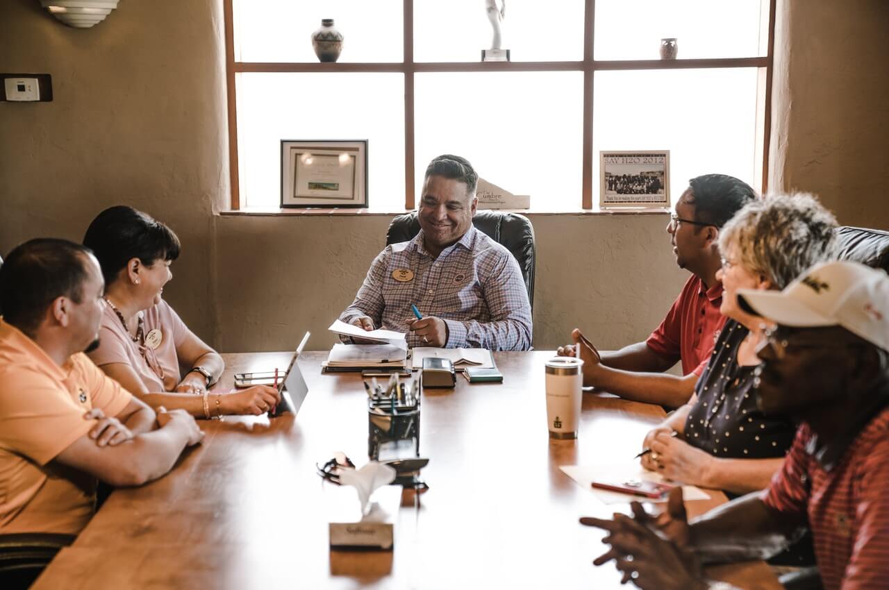 A-manager-in-a-meeting-with-his-team-members