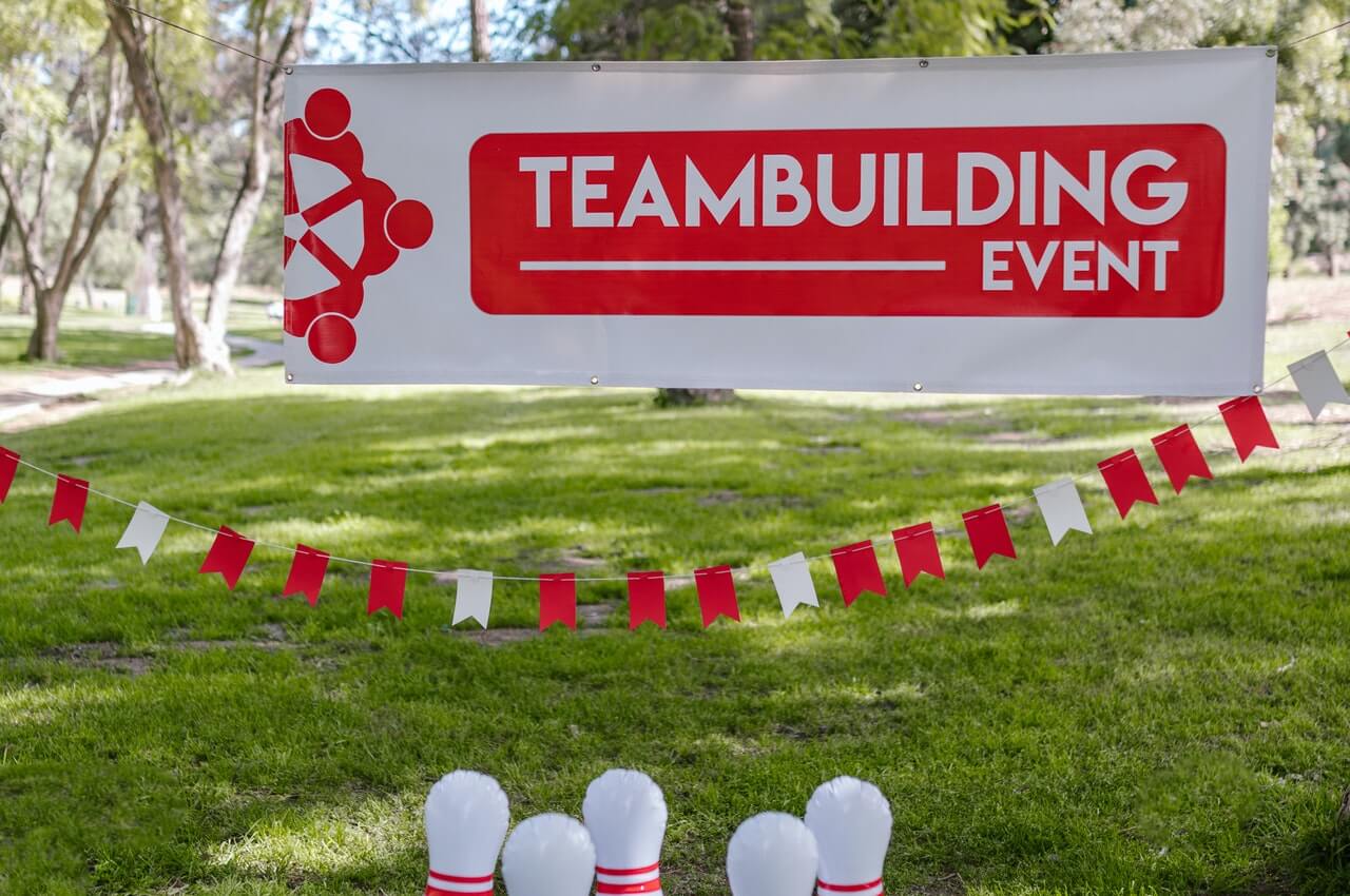 A-team-building-banner-hanged-on-a-field