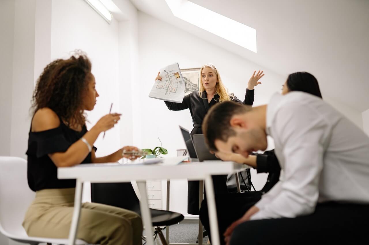 group of workers in disagreement