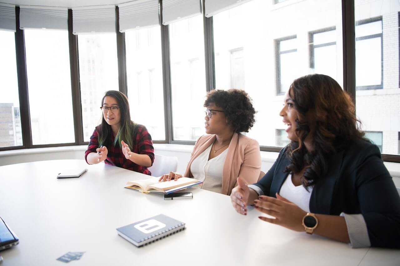 Women-discussing-in-a-meeting-room