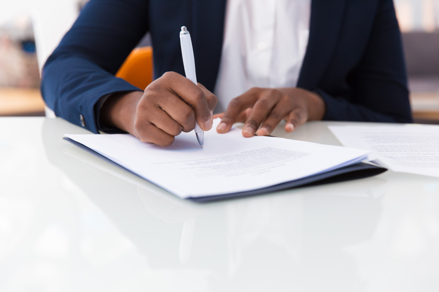 a woman writing a document