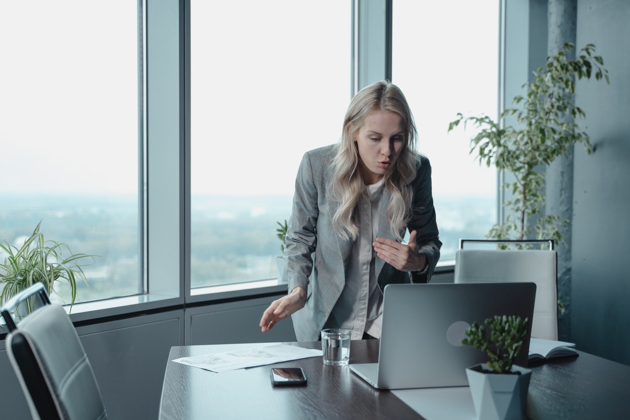 A-business-woman-outraged-with-a-colleague-in-a-video-cal