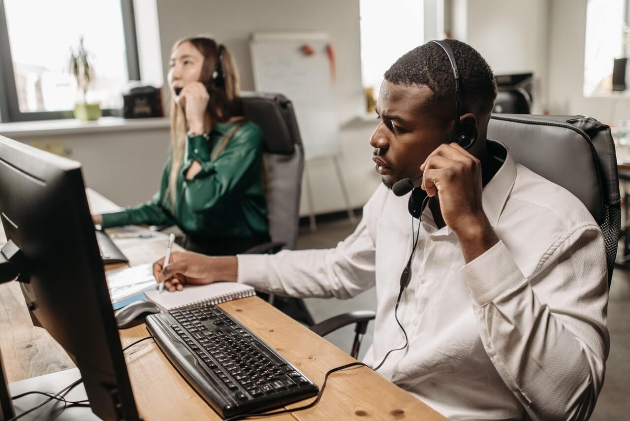 A call center respondent attending to someone over the phone