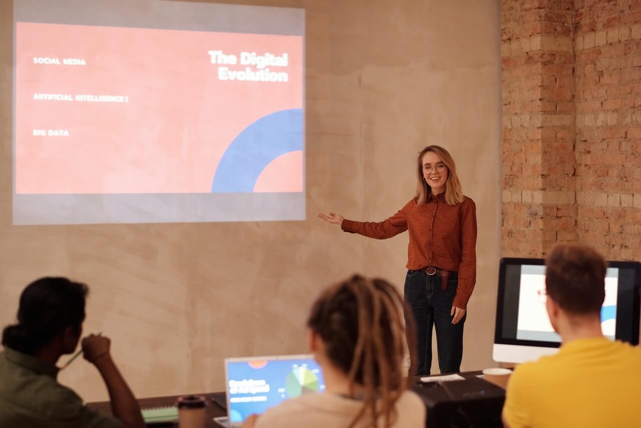 A young woman having a good presentation after overcoming her stage fright