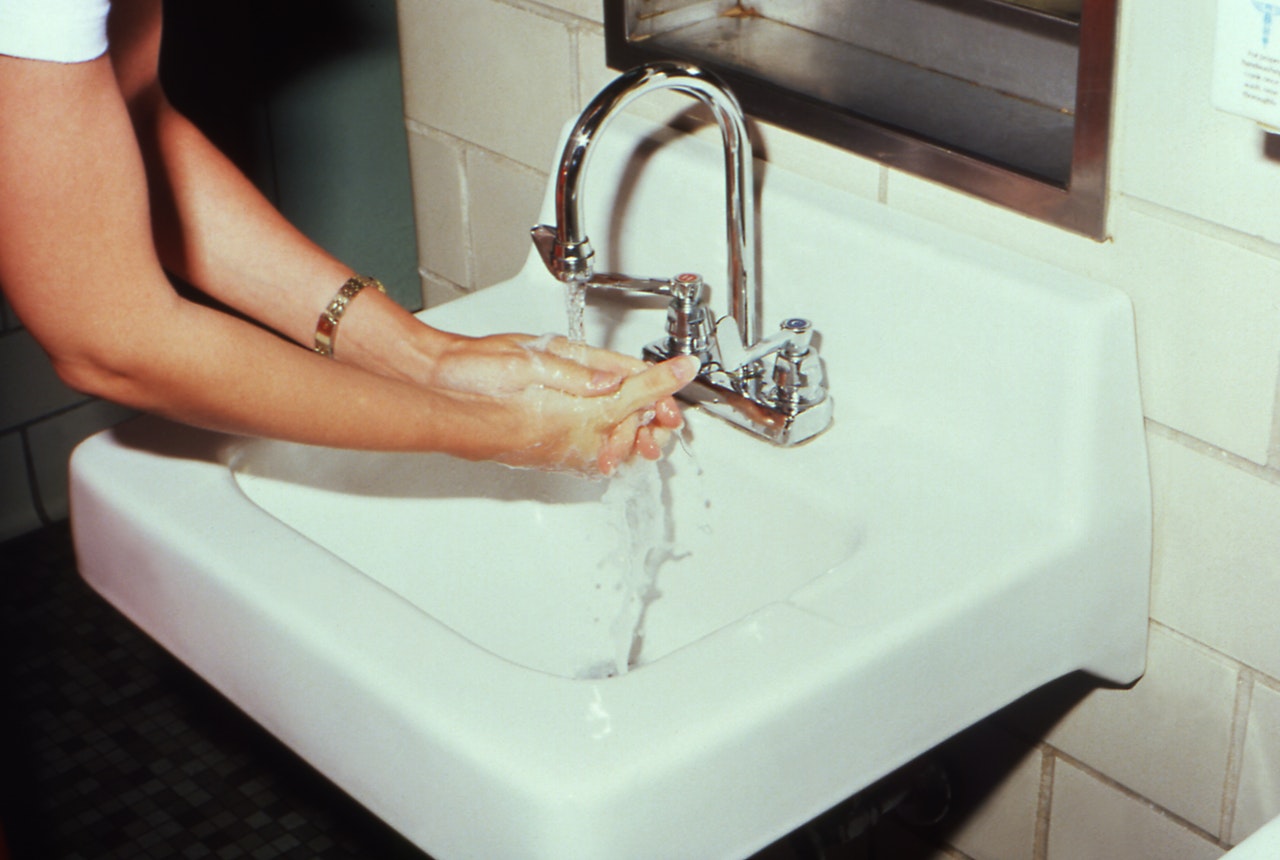 A-person-washing-hands-in-a-sink