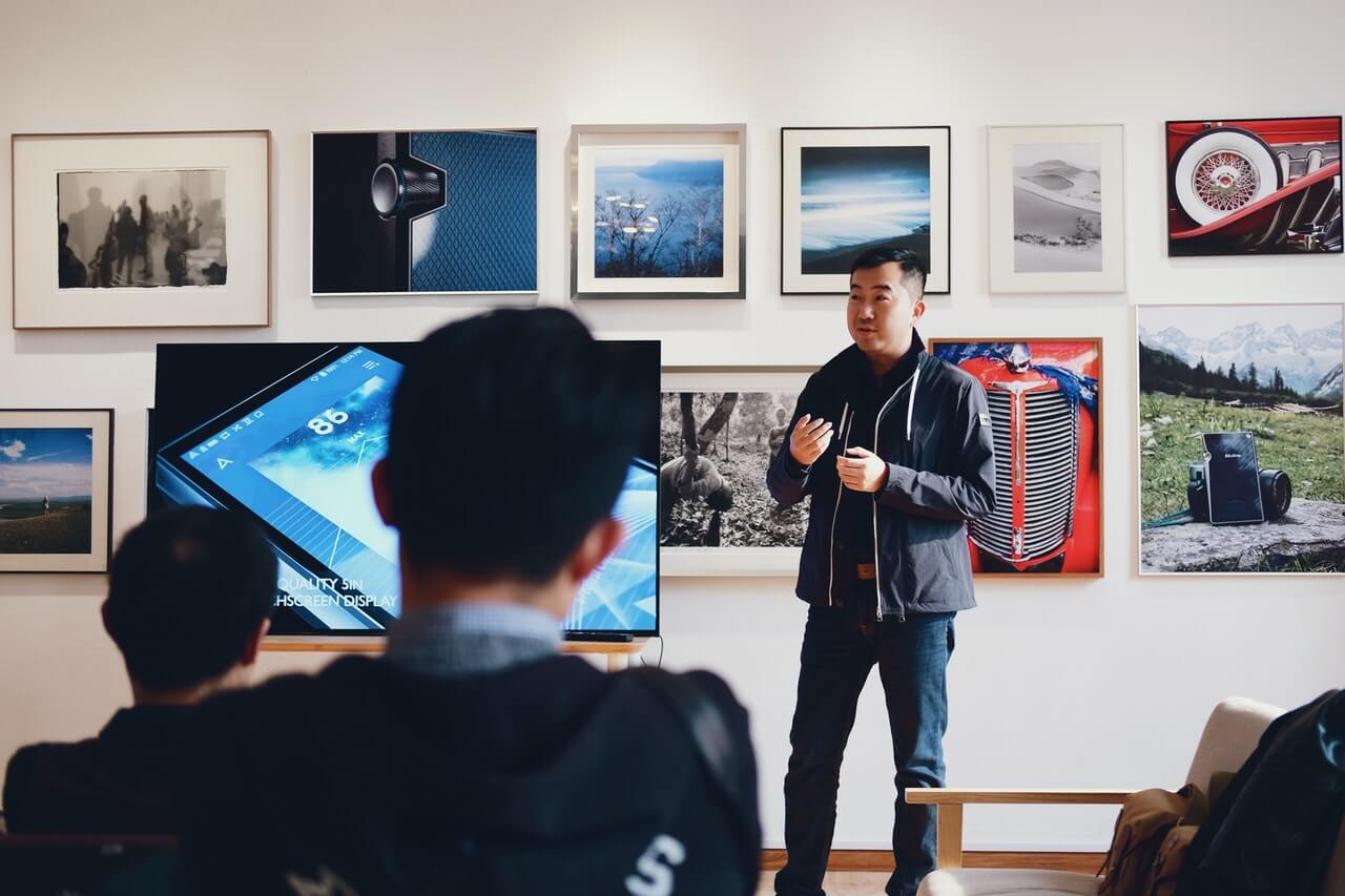 A prepared young man presenting in a meeting