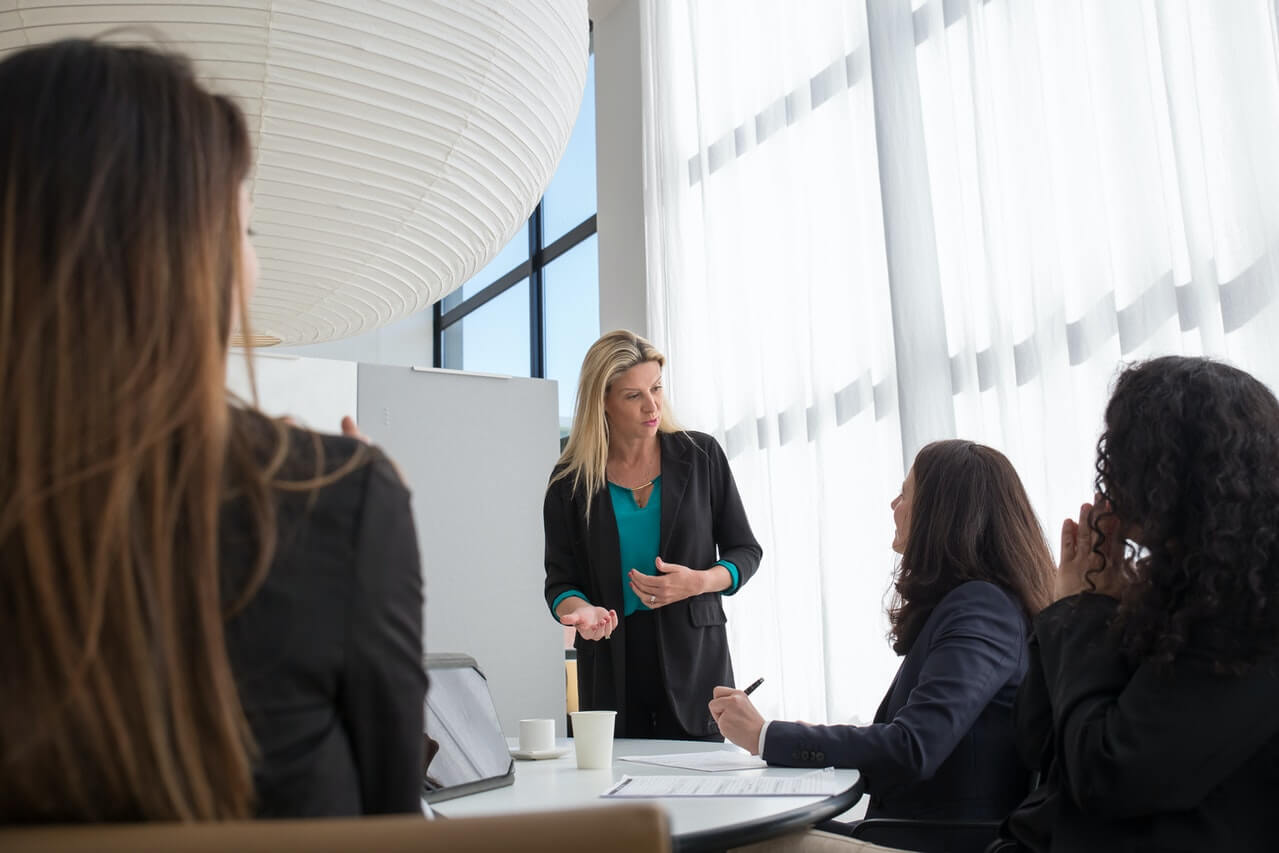 A-young-woman-giving-a-presentation