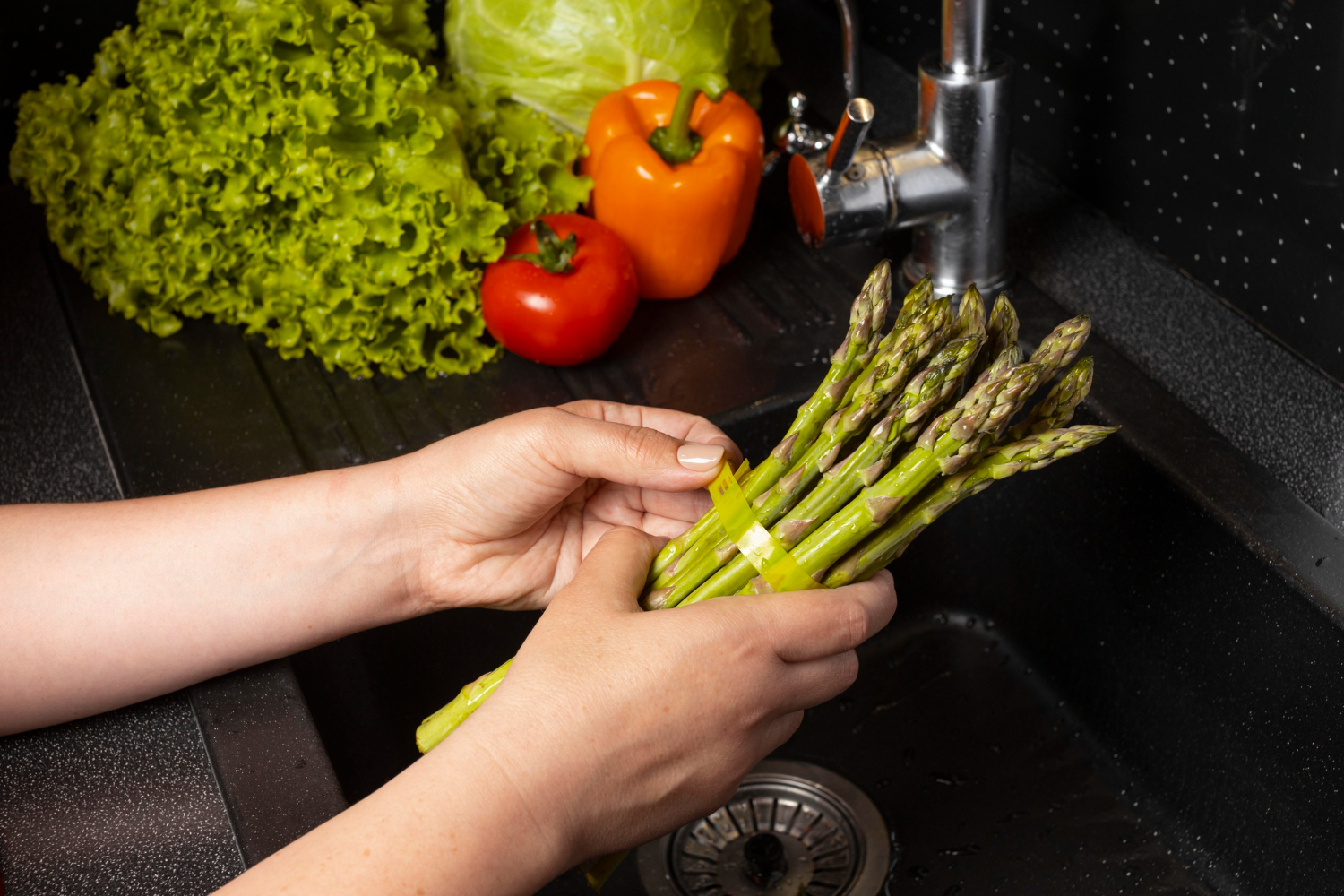 Arrangement-healthy-food-being-washed-to-avoid-contamination