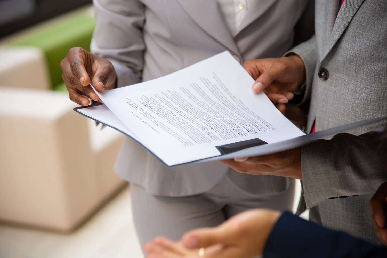 group of people going through a document together