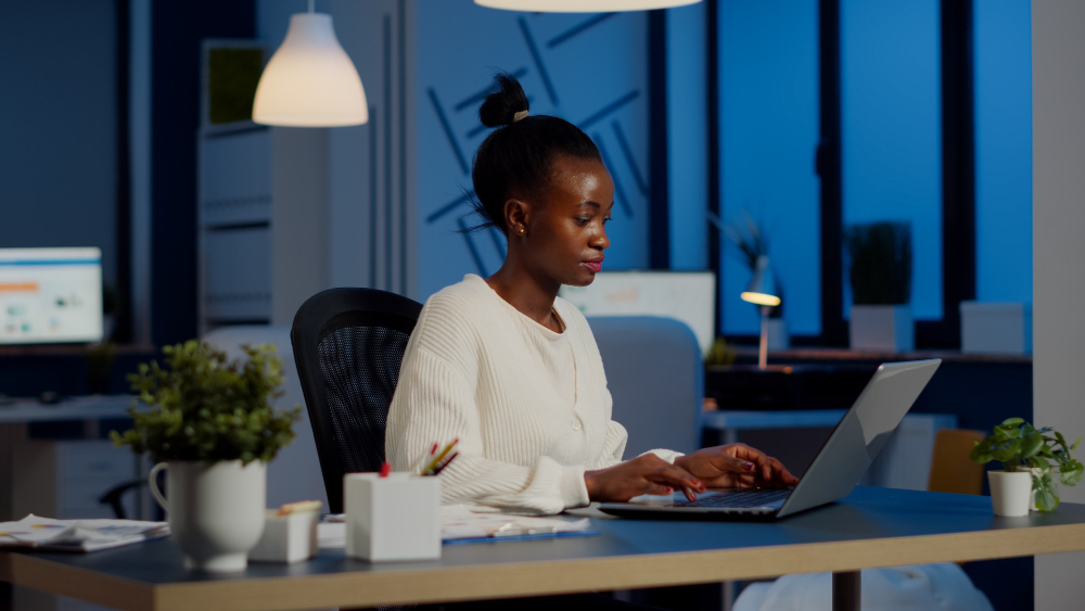 Business woman opening a DBA checking account online with her PC