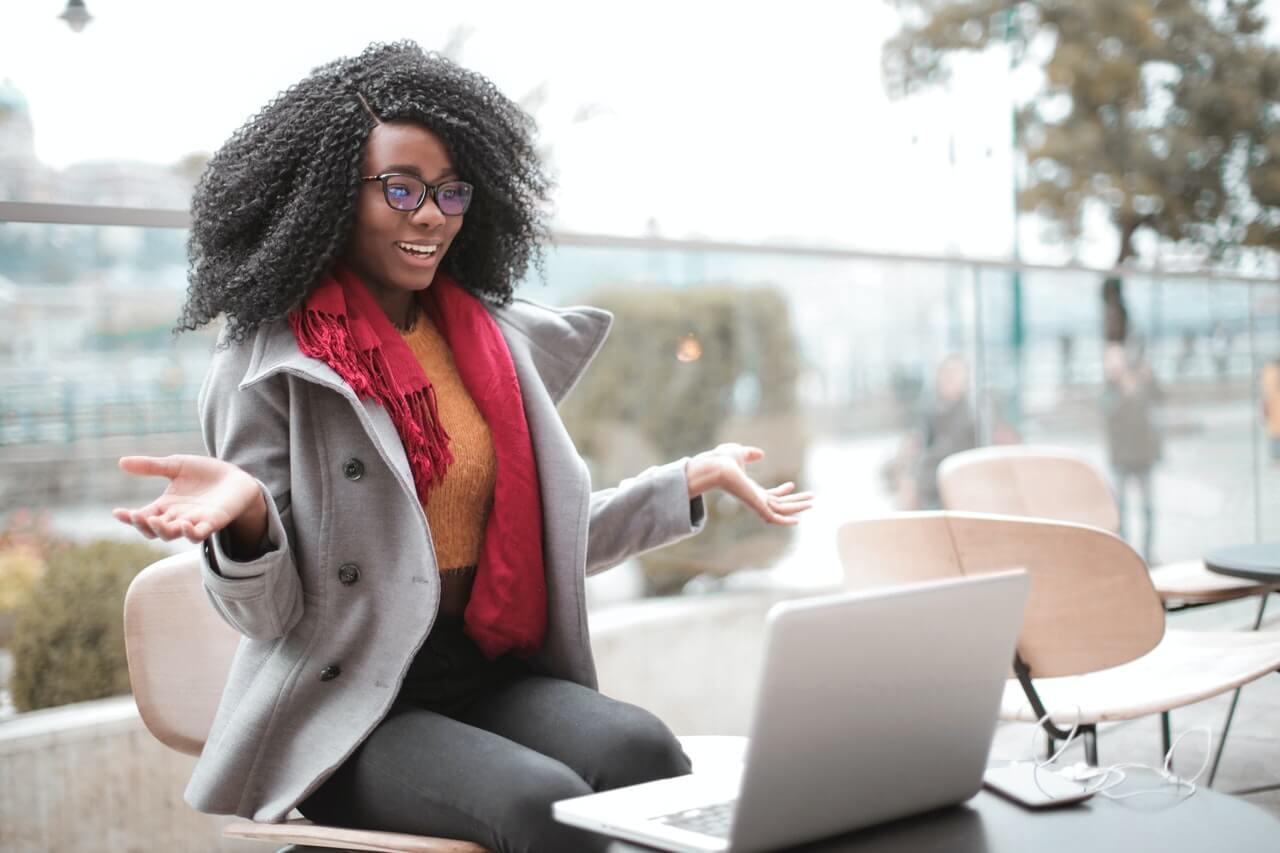 A nature born communicator giving a speech through her laptop