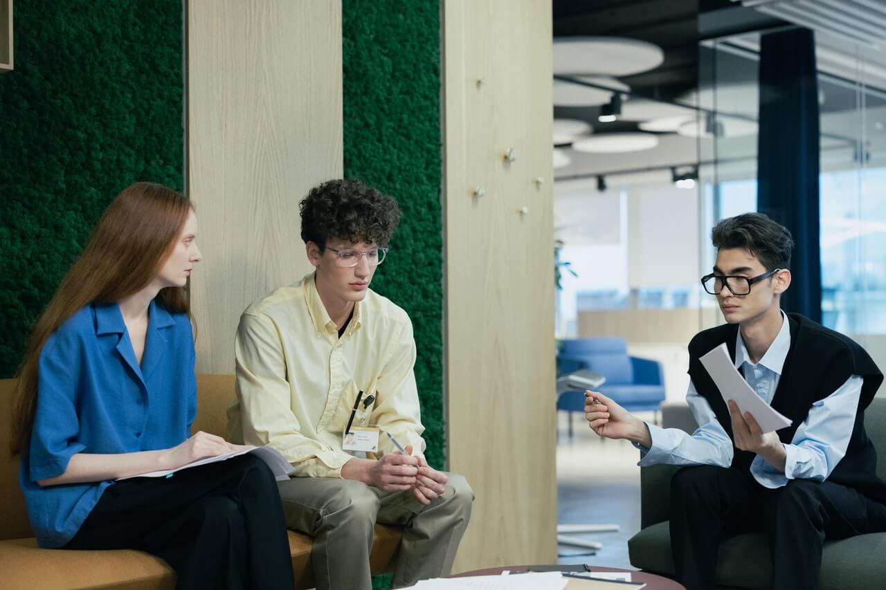 Colleagues having a meeting in an office space