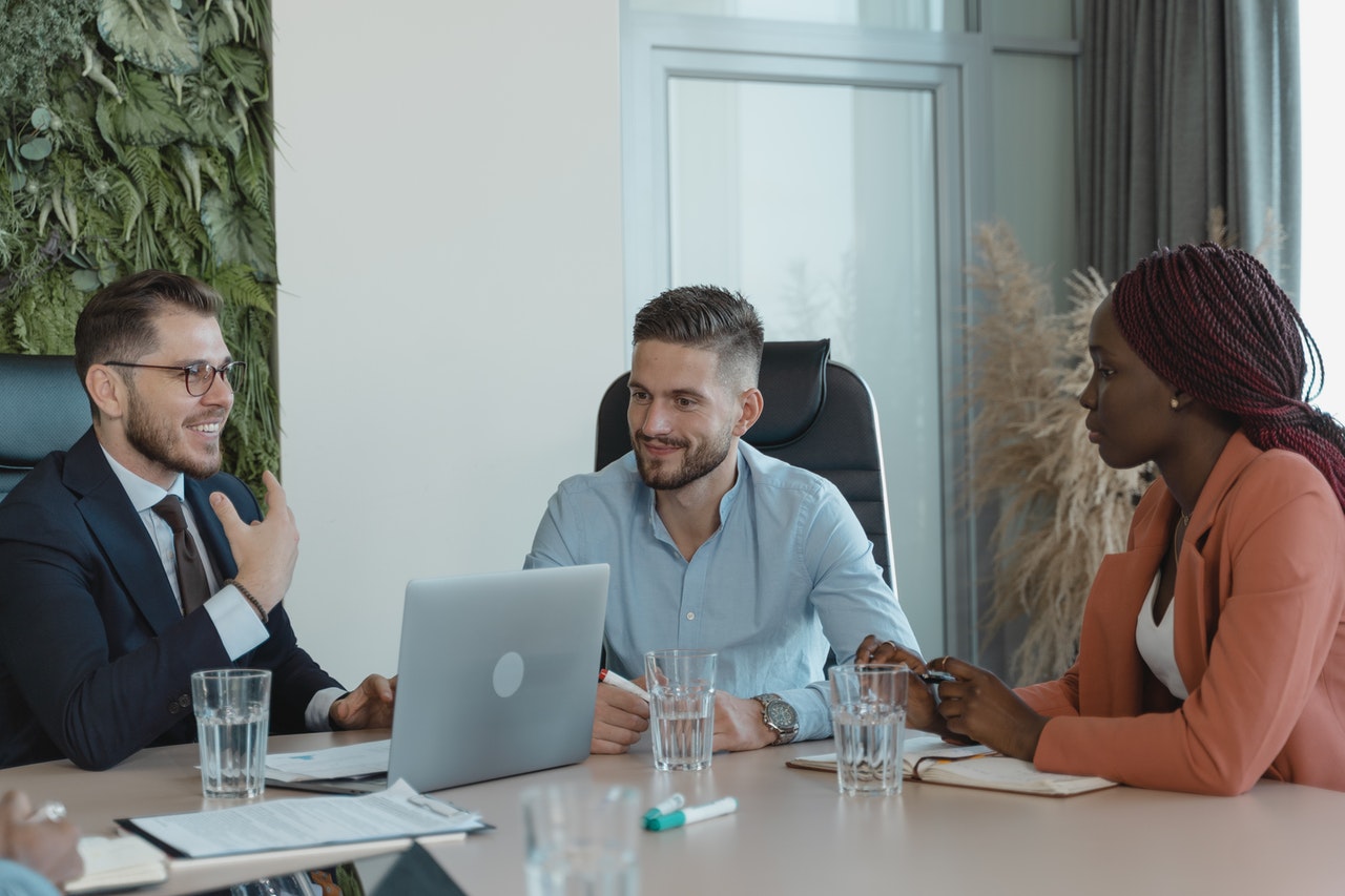 Coworkers in a Conference Room having a Meeting