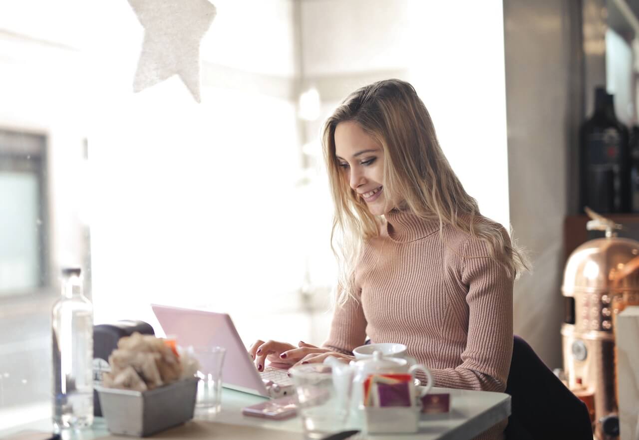 A young lady working with her laptop