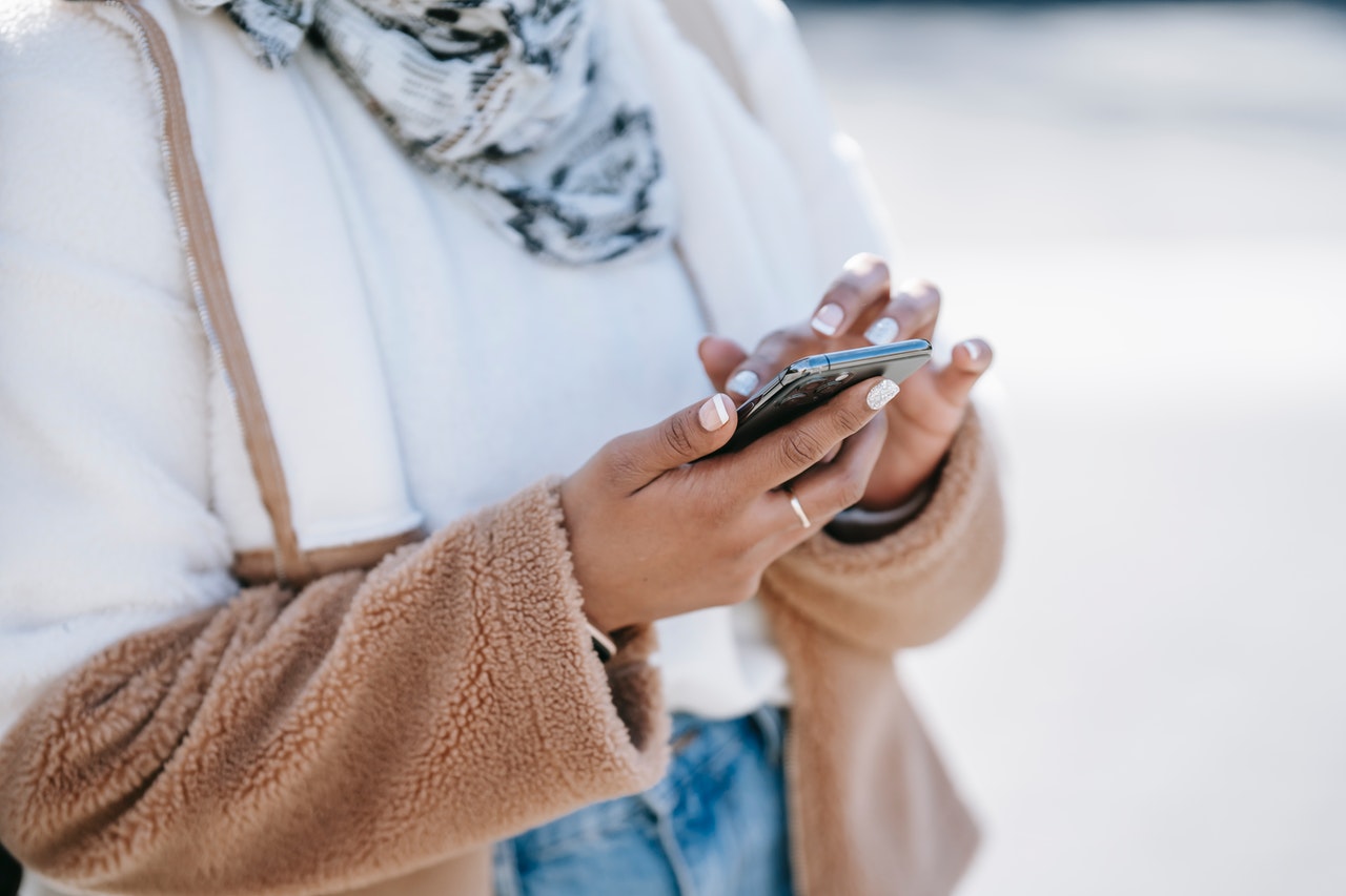 A lady using a smart phone