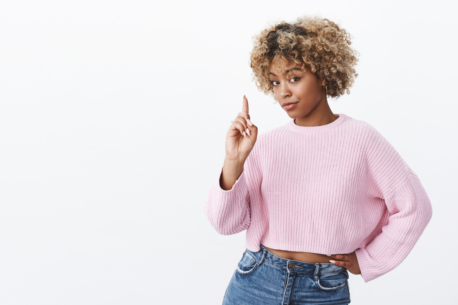 Woman pointing index finger giving wise advice