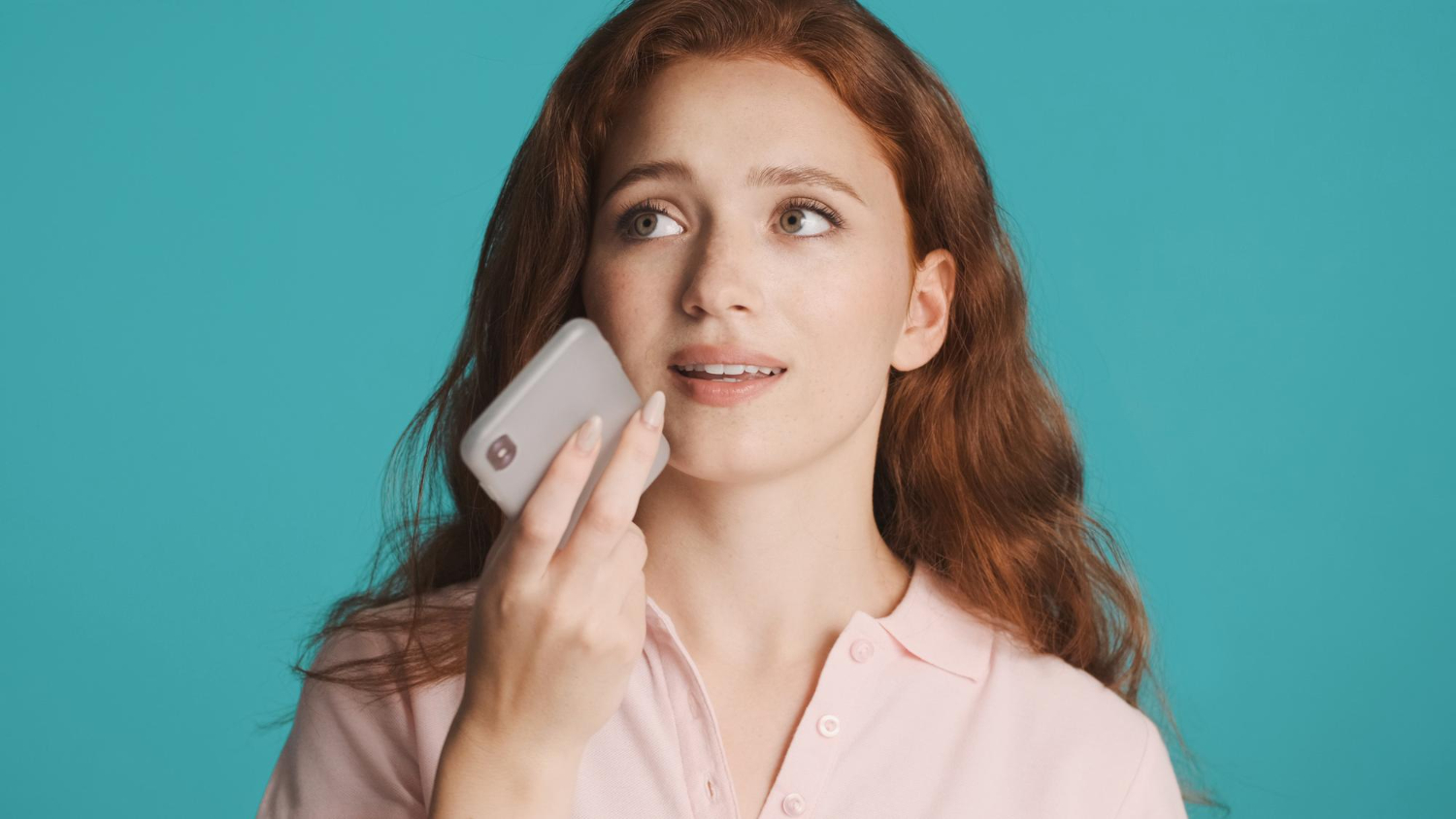 A Lady recording a voice mail