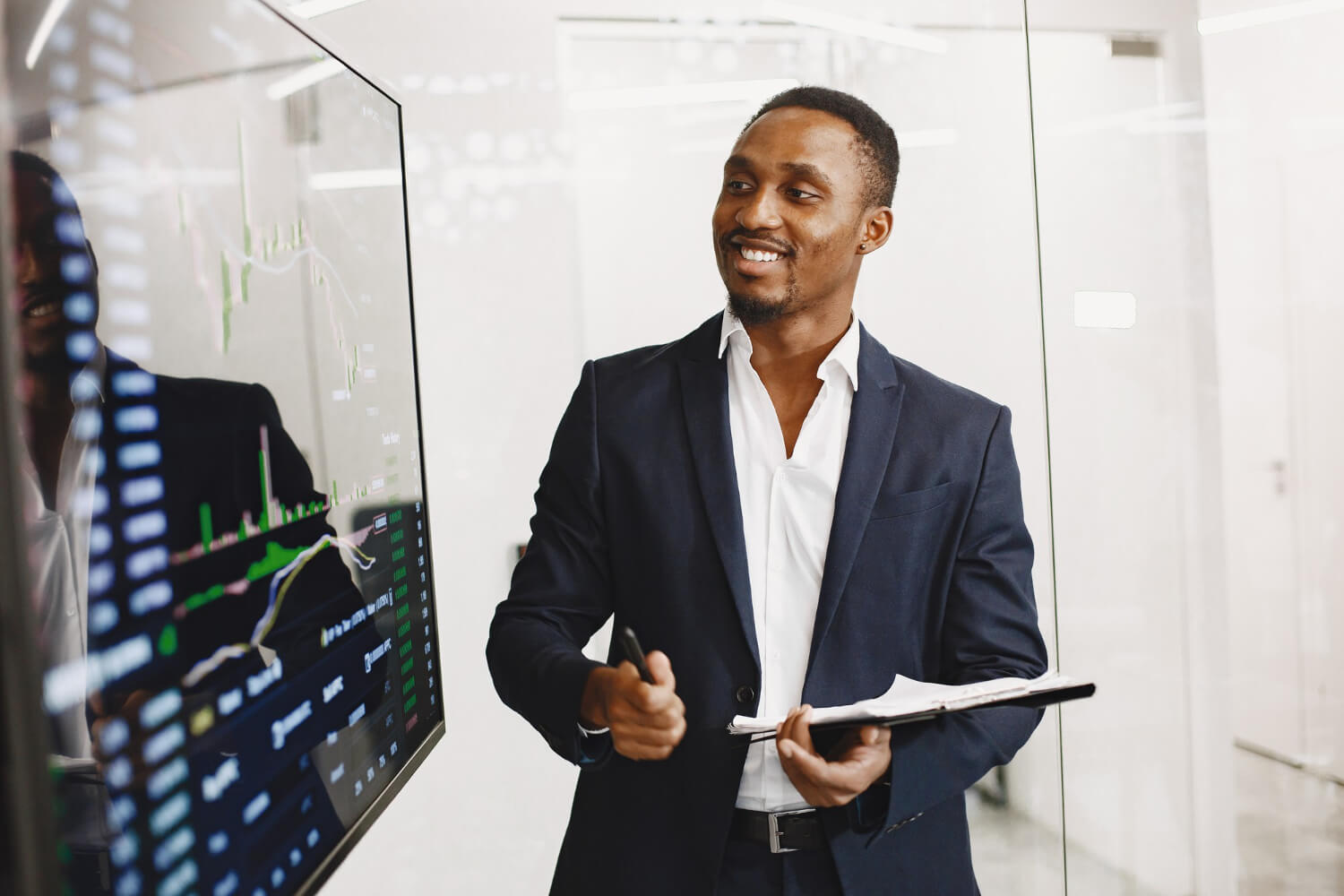 A young man with good presentation presenting in an office