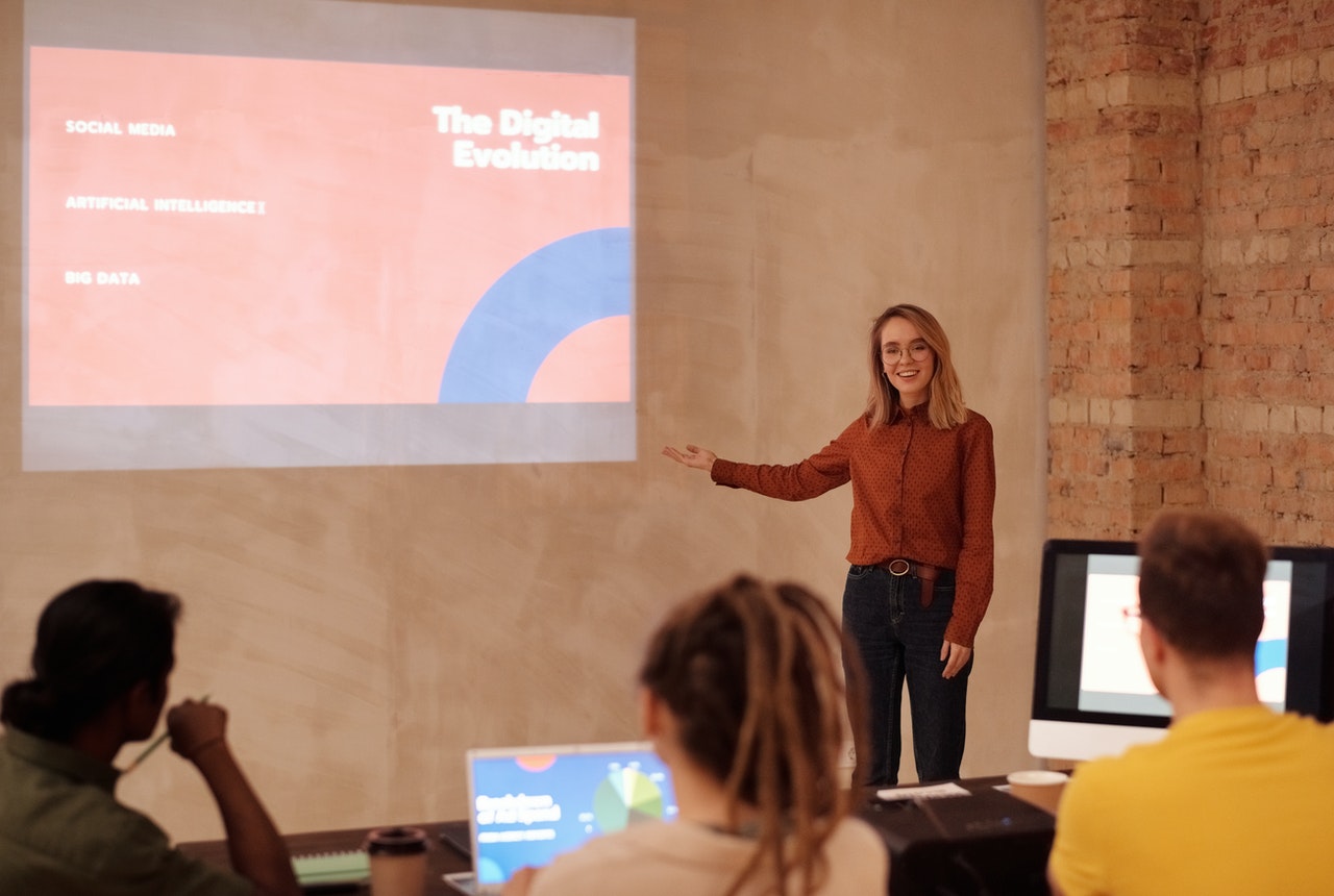 a-lady-using-powerpoint-to-present-in-a-meeting