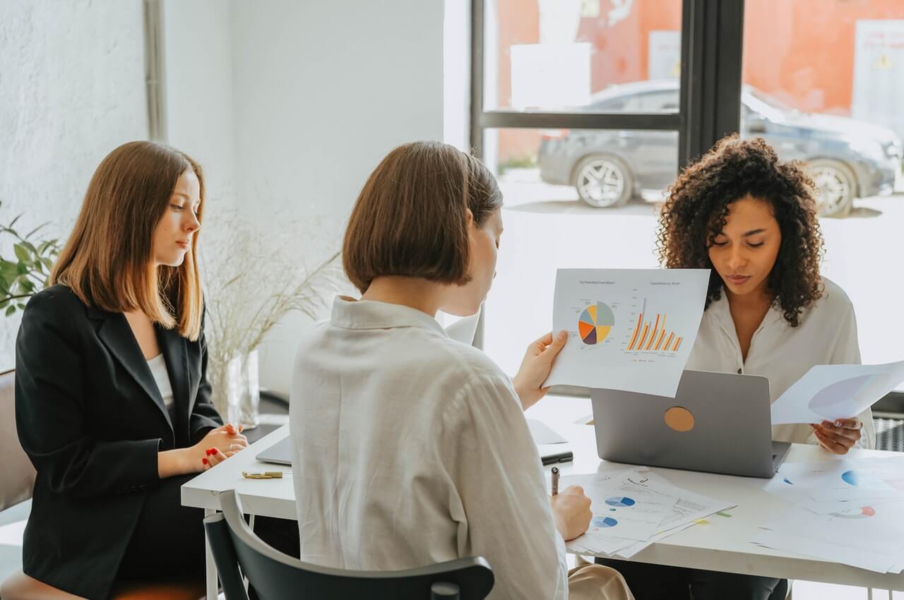 three-women-in-their-office-during-work-hours