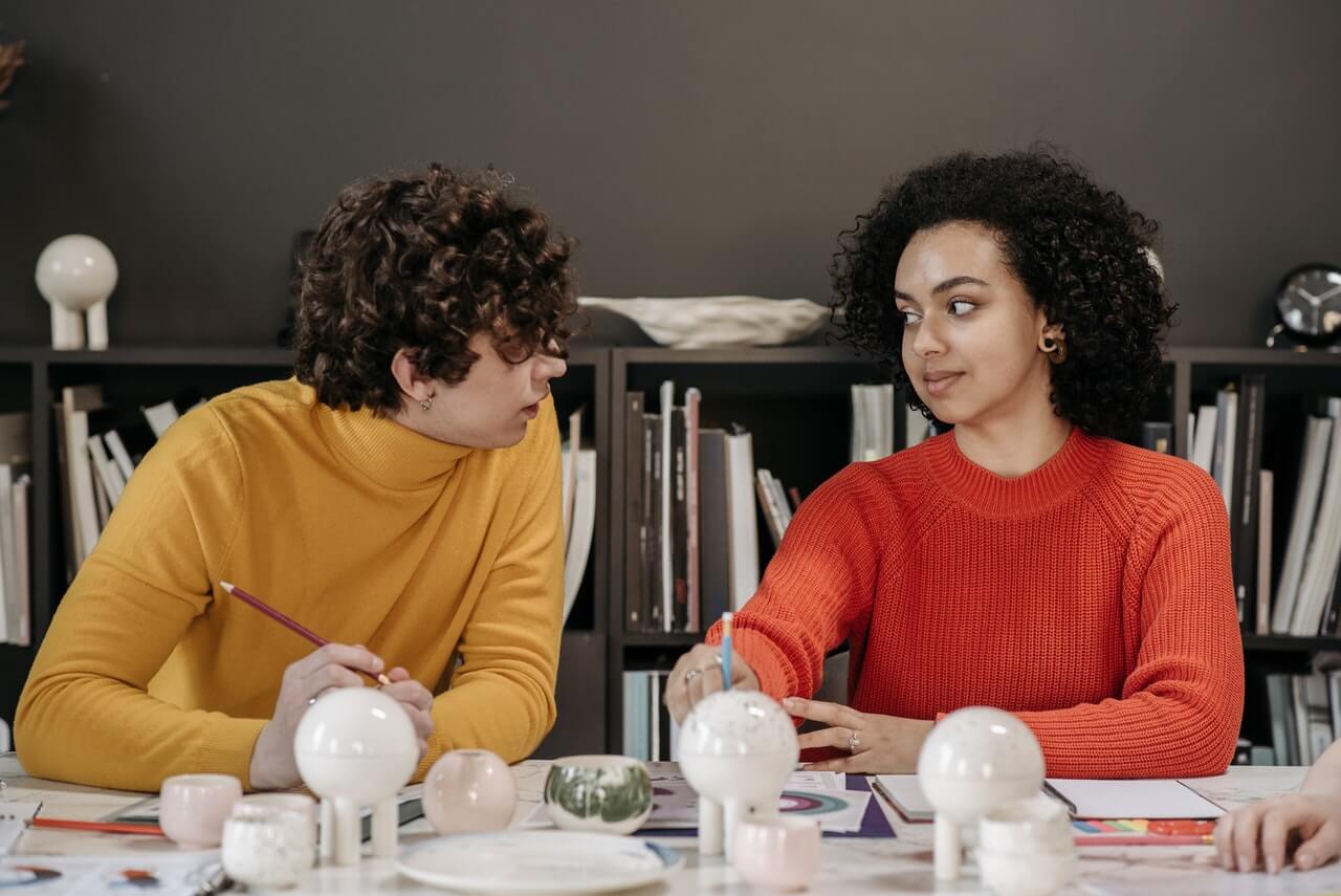 two young business people in a meeting