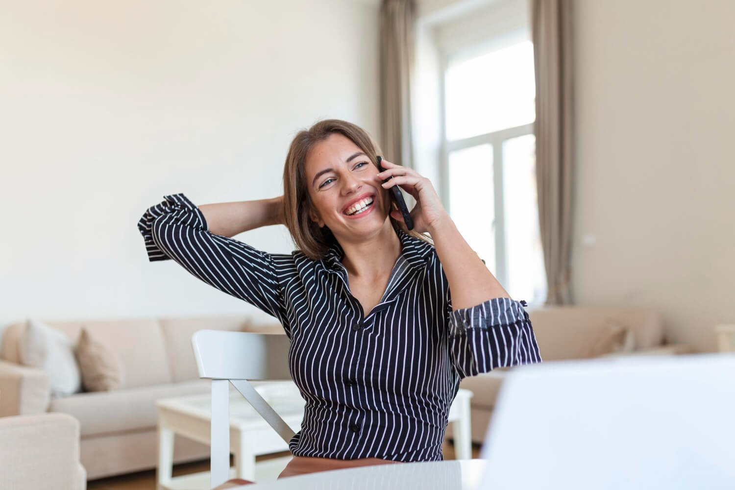 a lady talking to someone on the phone