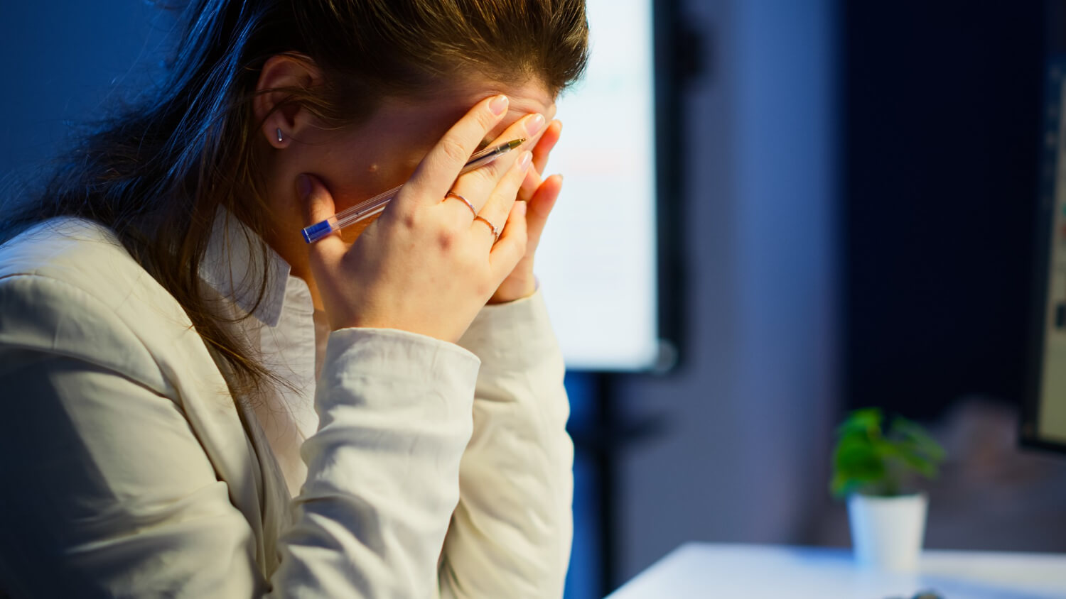 A-business-woman-worried-due-to-crisis-in-her-office